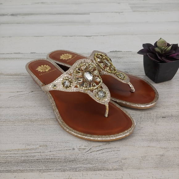 yellow box gold flip flops